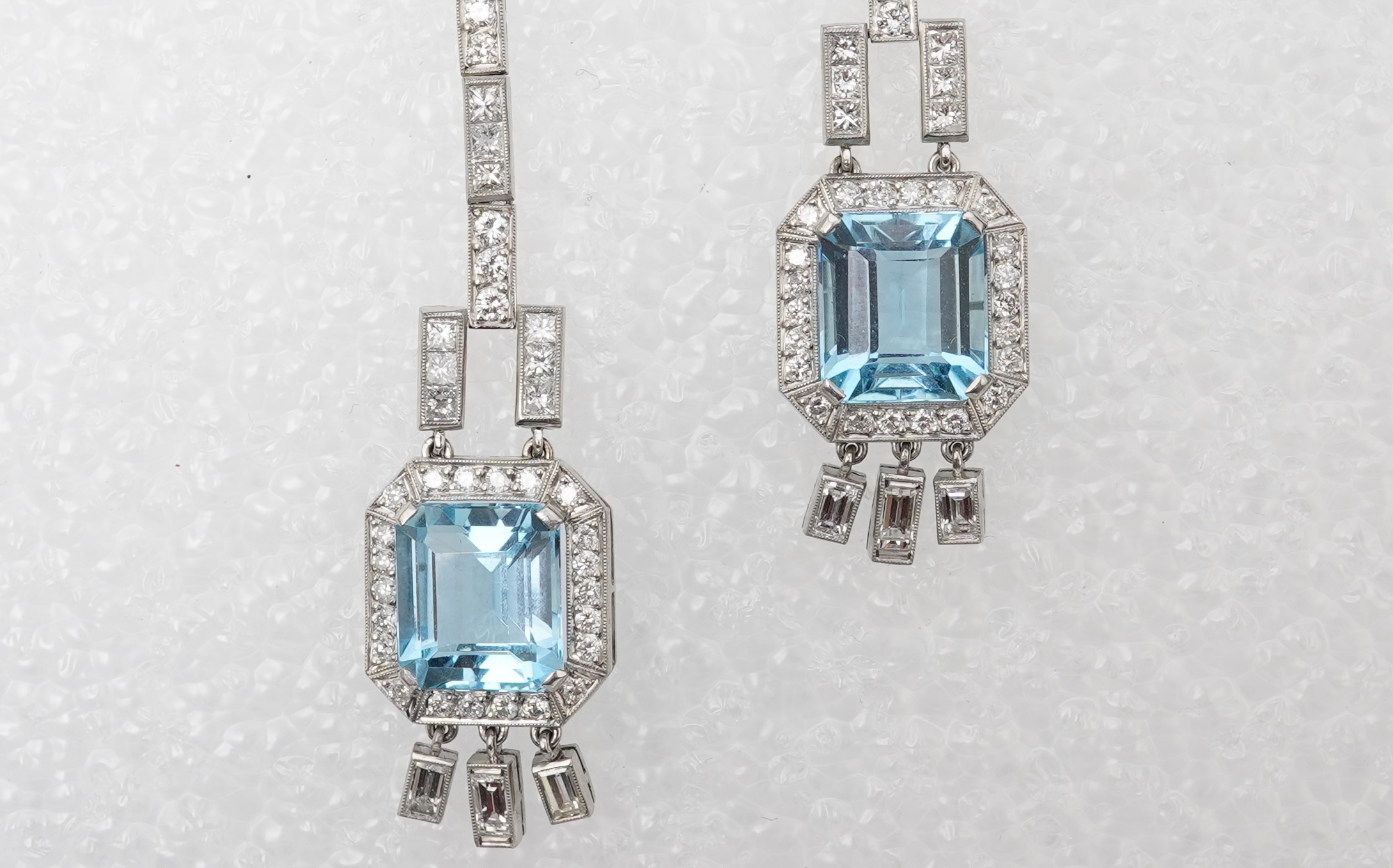 An attractive pair of aquamarine and diamond earrings